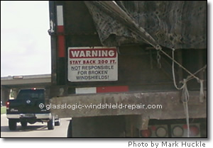 truck showing sign Not Responsible for Cracked Windshields