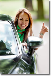 Girl in car giving thumbs up. Photo © Andres Rodriguez
